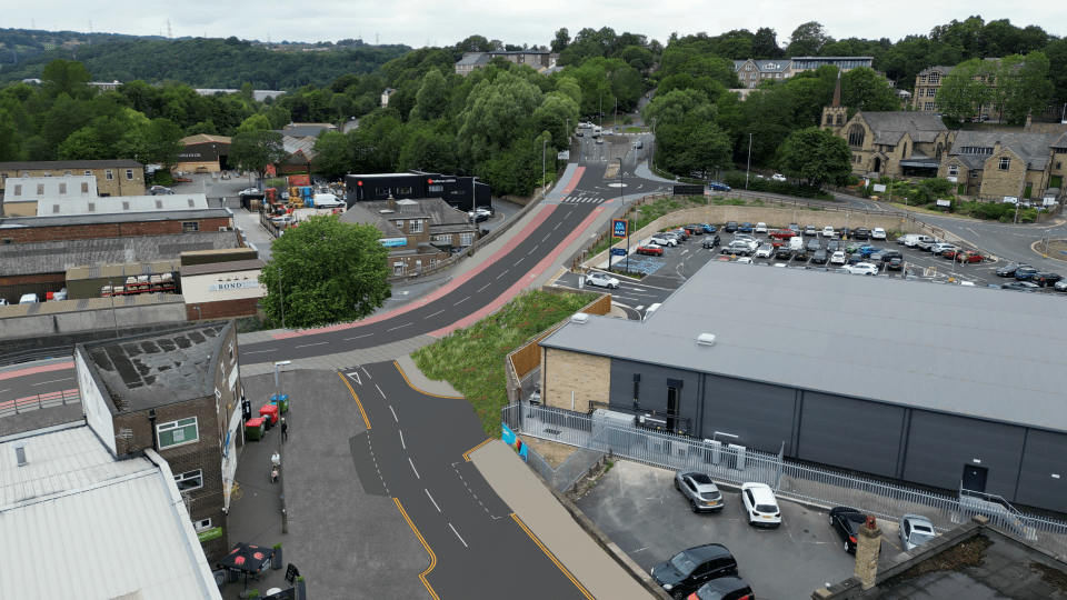 The new layout at Halifax Road north of the new bridge at the junction with Owler Ings Road, featuring new cycle routes and crossings.