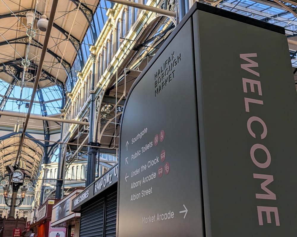 Close-up of a digital totem in the market.