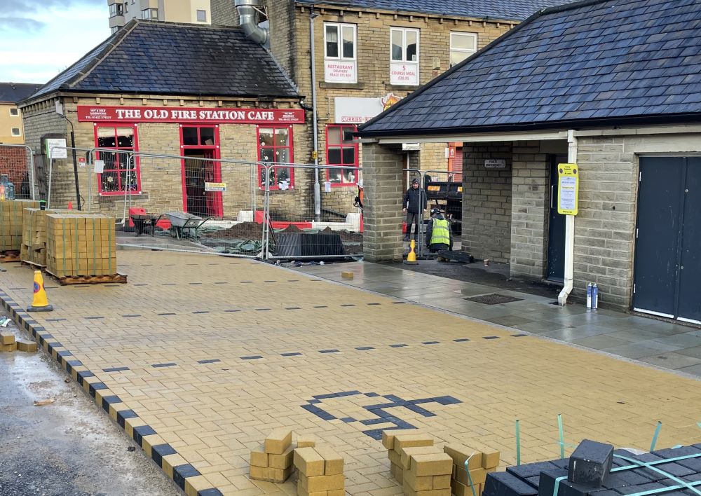 Detail of block paving for parking and disabled bays in Market Square near the Old Fire Station Cafe.